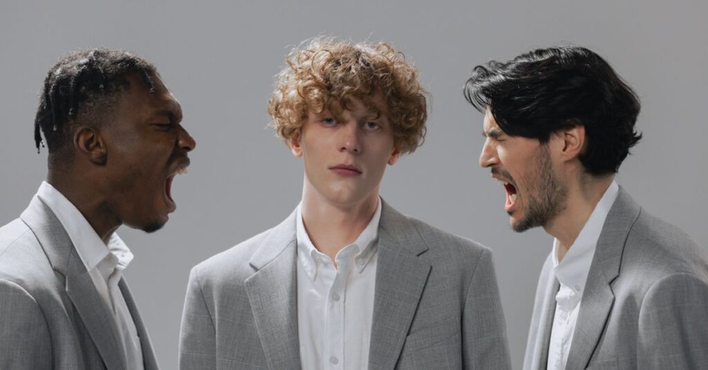 Three men in office attire expressing emotion in a corporate setting.